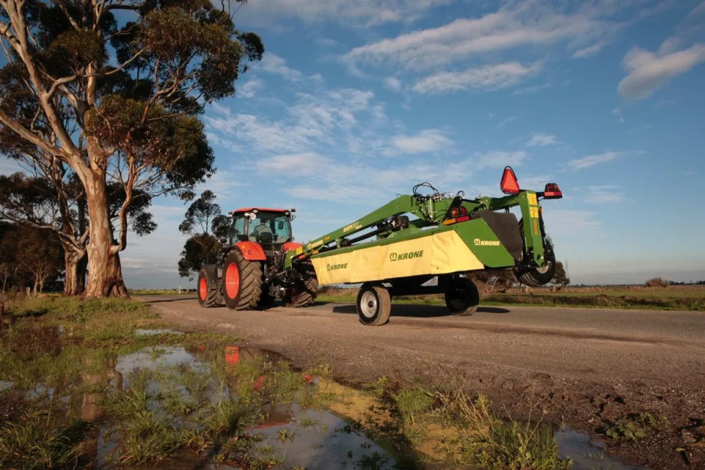 Krone EC500TC in a field behind a Kubota tractor